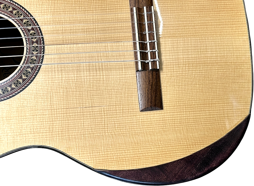 The bevelled armrest of a Kantare classical guitar